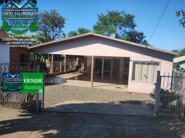 Terreno de 712m� com Duas Casas na Av. Palmeira das Miss�es